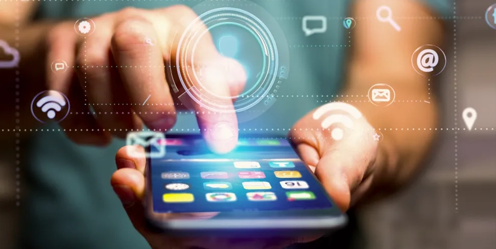 Person using a smartphone with digital interface icons, representing innovations by a mobile app development company